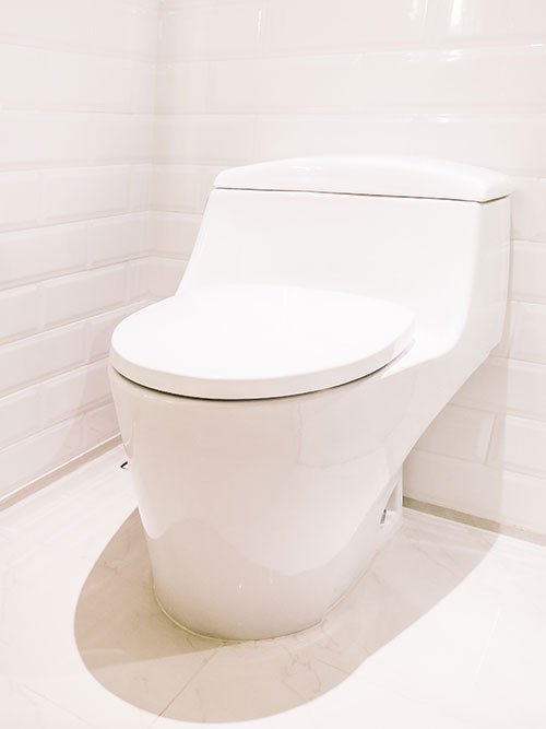 Toilet with heated seat